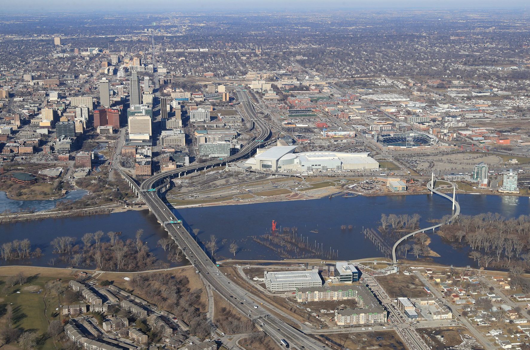 A westward, aerial view of a flooded Tom Hanafan River's Edge Park on Friday.